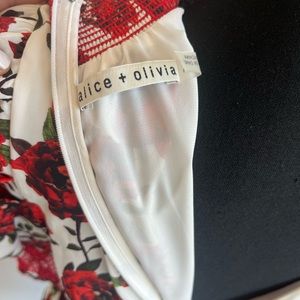 Alive and Olivia Rose bud dress with puffy sleeves.